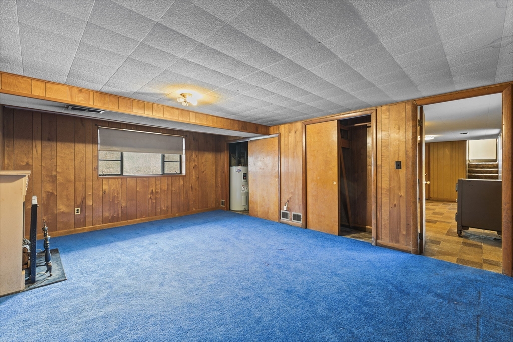 2 Alwin Street Boston, MA 02136 - Photo 34 of 43 a view of empty room with wooden floor and entryway