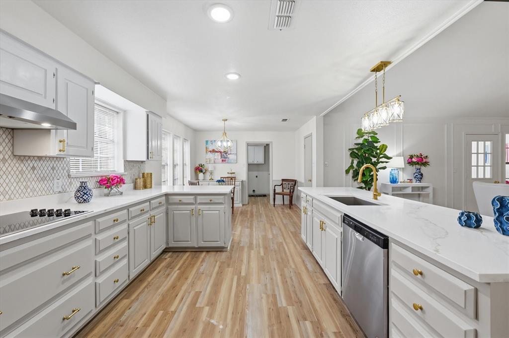 5808 Ridge Drive Arlington, TX 76016 - Photo 12 of 40 a kitchen with sink stove and cabinets