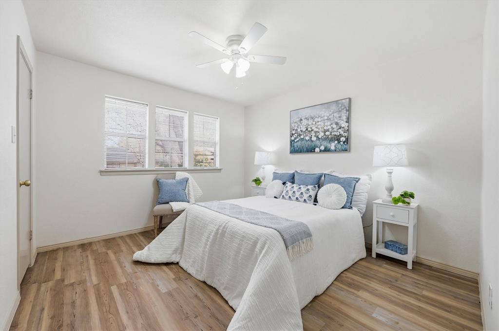 5808 Ridge Drive Arlington, TX 76016 - Photo 27 of 40 a bedroom with a bed and a window