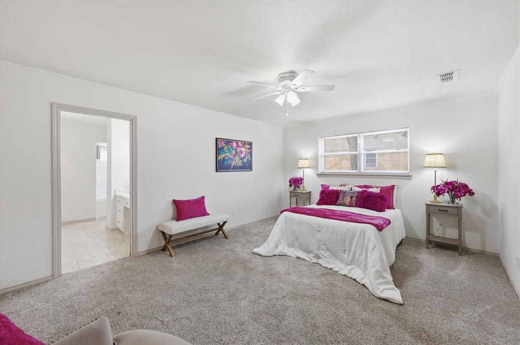 5808 Ridge Drive Arlington, TX 76016 - Photo 28 of 40 a bedroom with a bed and furniture