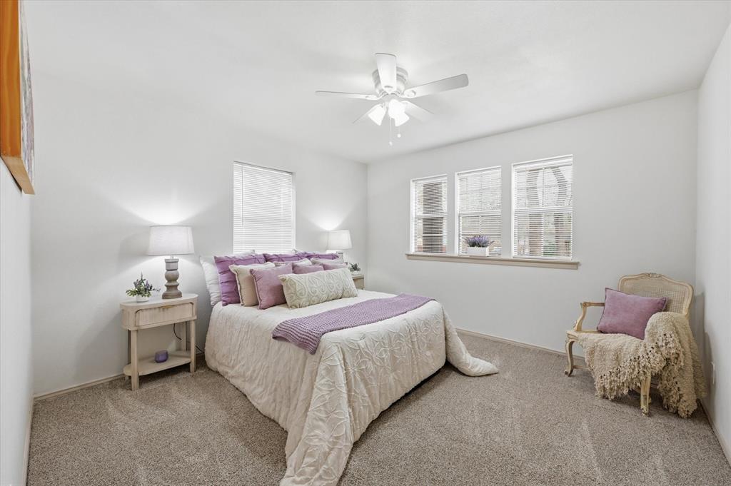5808 Ridge Drive Arlington, TX 76016 - Photo 34 of 40 a bedroom with a bed and window