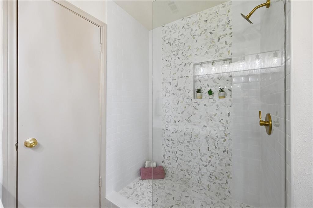 5808 Ridge Drive Arlington, TX 76016 - Photo 36 of 40 a bathroom with a shower