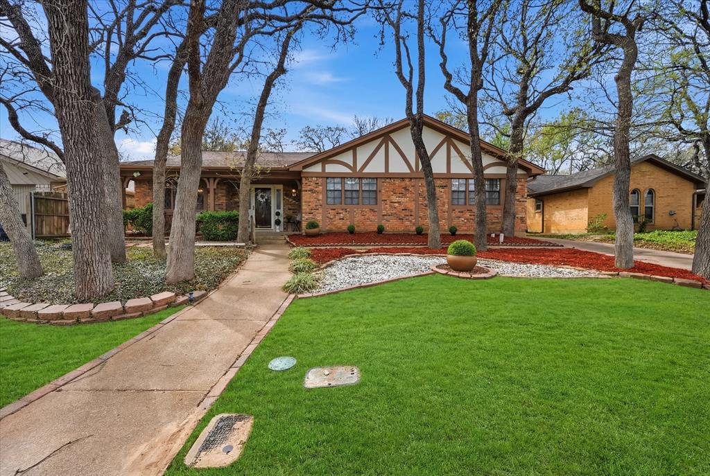 5808 Ridge Drive Arlington, TX 76016 - Photo 40 of 40 a front view of a house with garden
