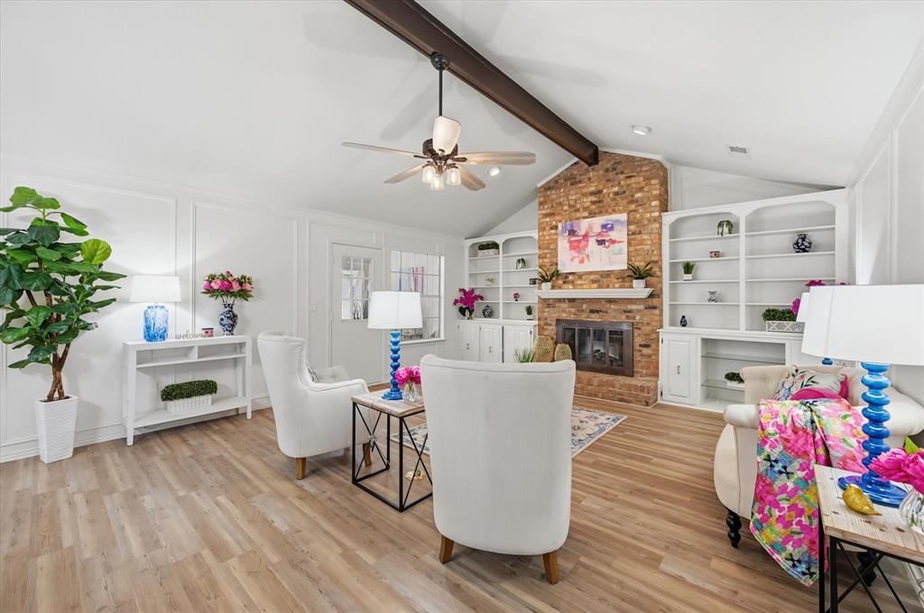 5808 Ridge Drive Arlington, TX 76016 - Photo 5 of 40 a living room with furniture and a kitchen area