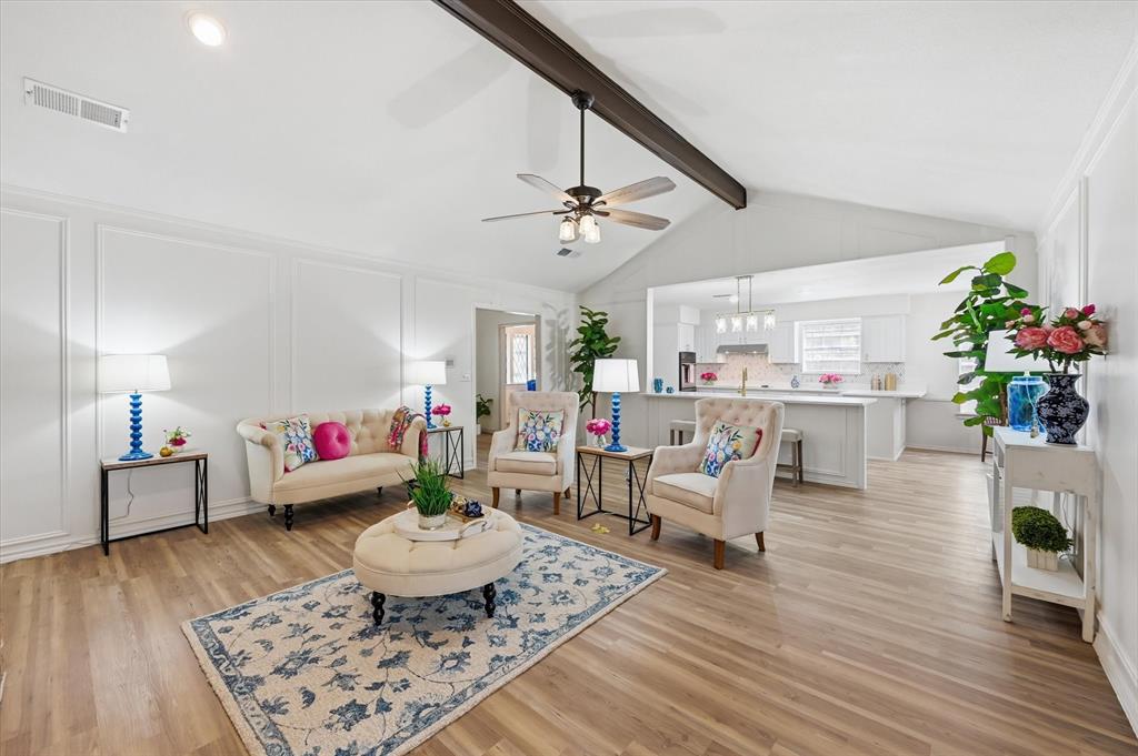 5808 Ridge Drive Arlington, TX 76016 - Photo 6 of 40 a living room with furniture and a wooden floor