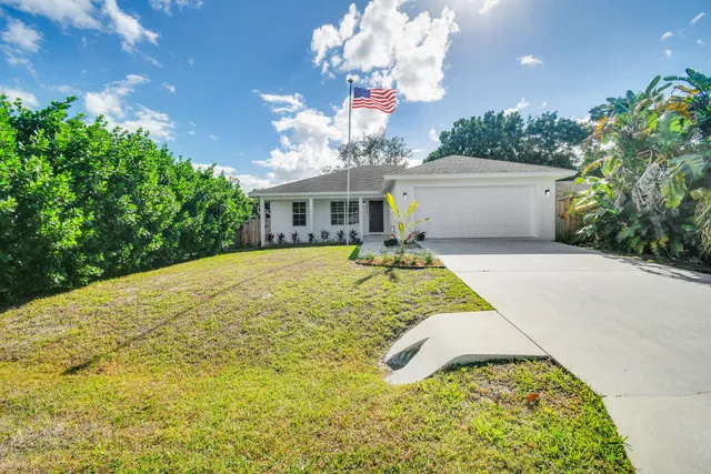 a view of a house with a swimming pool