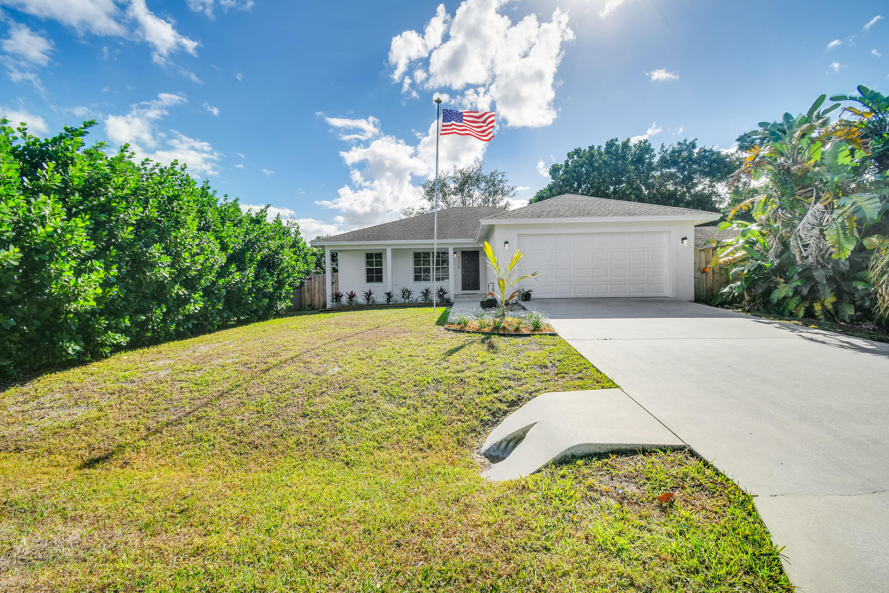 a view of a house with a swimming pool