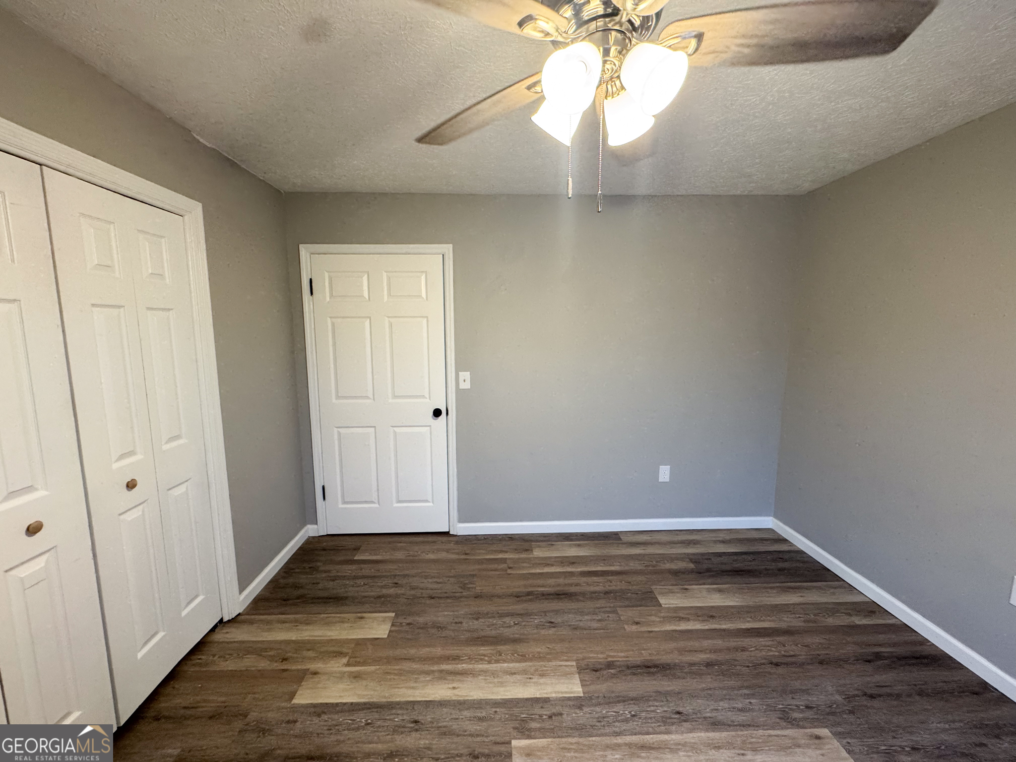 1705 Moses Drive Vidalia, GA 30474 - Photo 12 of 23 wooden floor in an empty room