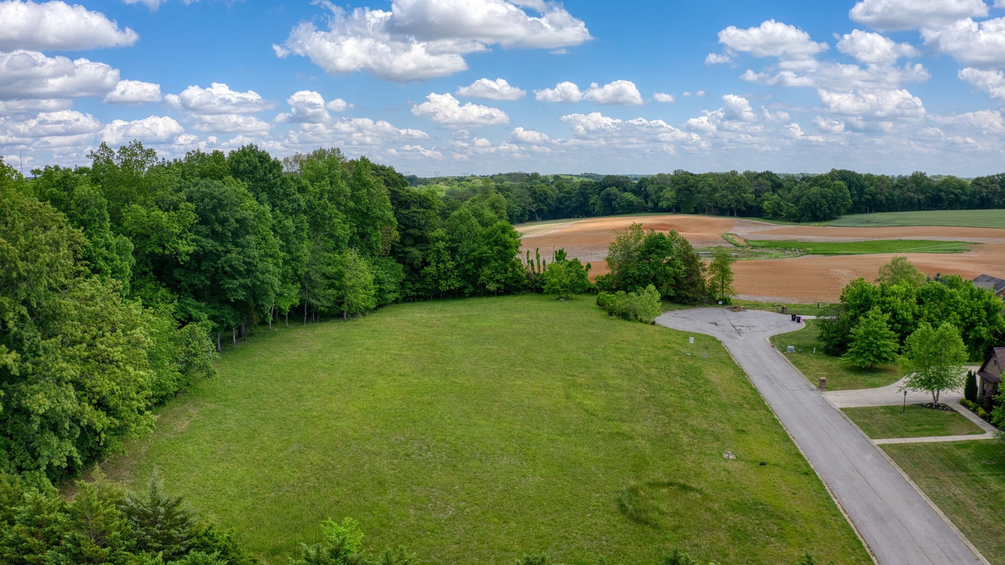 24 Port Royal Estate Adams, TN 37010 - Photo 3 of 37 a view of a lake with a yard