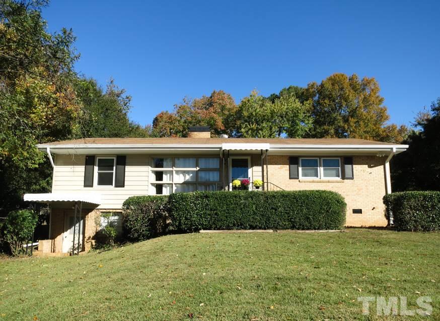 105 Dartmouth Road Raleigh, NC 27609 - Photo 1 of 25 UPDATED 3BR/2BA/1821sf Midtown ranch in Farrior Hills w/unfinished basement storage! Near I-440; WALK TO NORTH HILLS SHOPS/DINING! On .47 ac wooded lot w/detached 2-car Garage in backyard surrounded by tall trees.