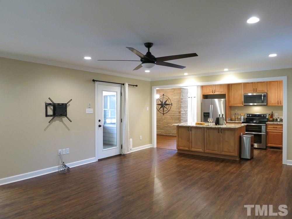 105 Dartmouth Road Raleigh, NC 27609 - Photo 12 of 25 Another view of the Family Rm shows how open it is to the Kitchen.