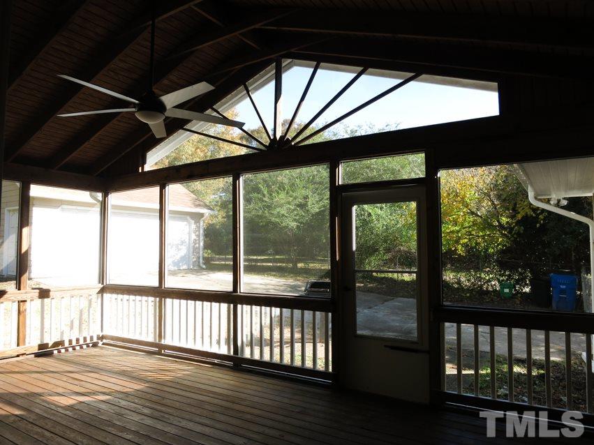105 Dartmouth Road Raleigh, NC 27609 - Photo 13 of 25 The spacious vaulted Screened Porch offers a CF.
