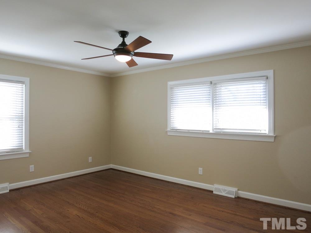 105 Dartmouth Road Raleigh, NC 27609 - Photo 18 of 25 There are 2 addl spacious Bedrooms w/CFs & lg closets. This is Bedroom 2.