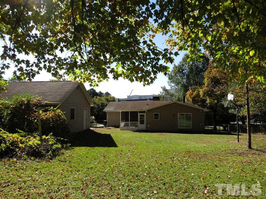 105 Dartmouth Road Raleigh, NC 27609 - Photo 22 of 25 There is a detached 2-car Garage, gas line to the grill & 2 storage sheds in the spacious backyard surrounded by tall trees.