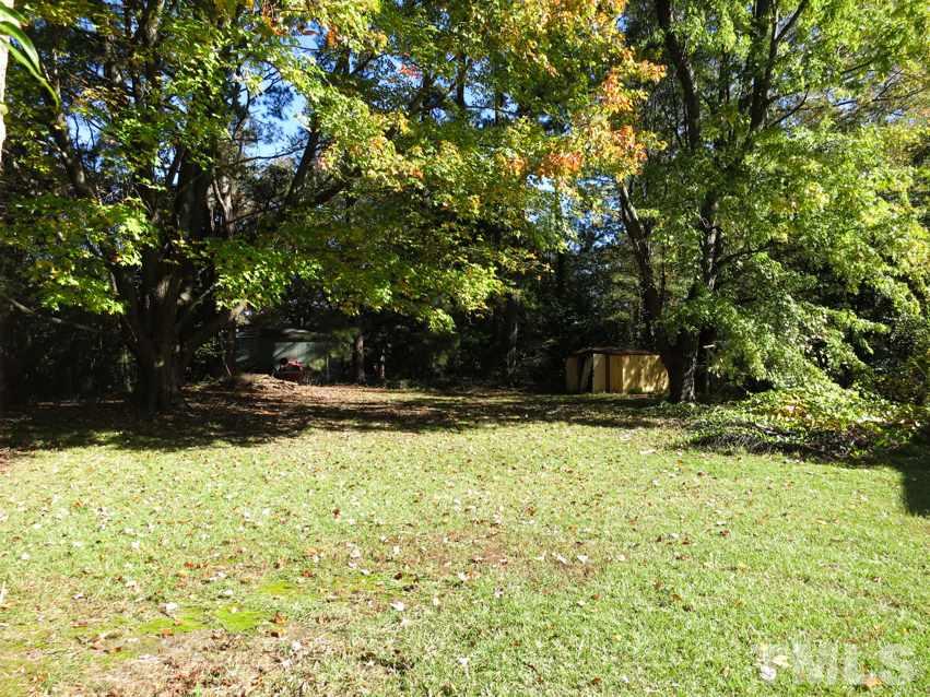 105 Dartmouth Road Raleigh, NC 27609 - Photo 23 of 25 View of the fenced & wooded backyard.
