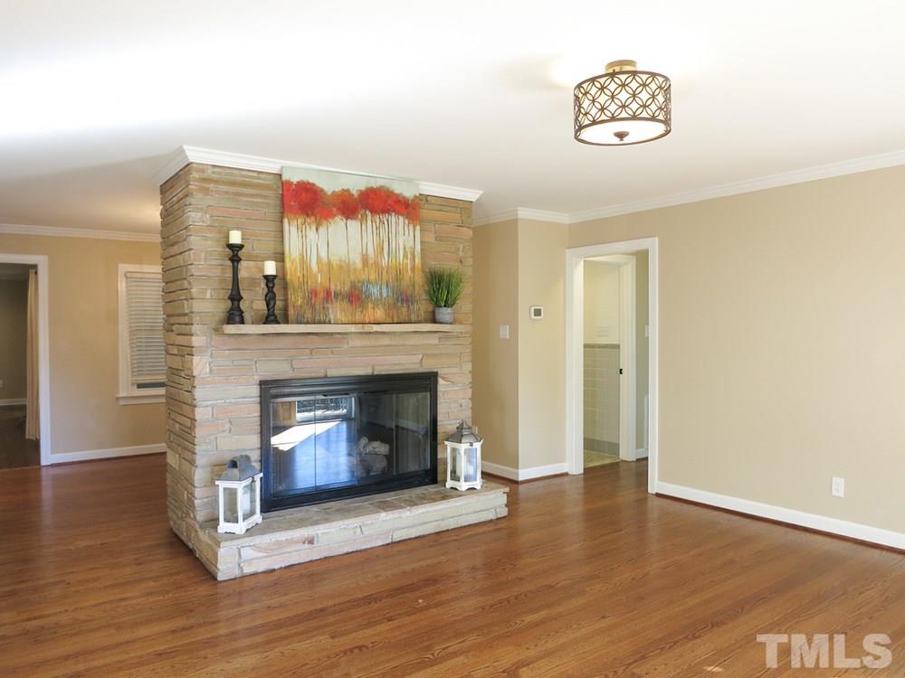 105 Dartmouth Road Raleigh, NC 27609 - Photo 4 of 25 Spacious Living Rm opens to the Dining Rm.