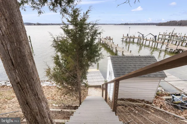 a view of a lake with a house