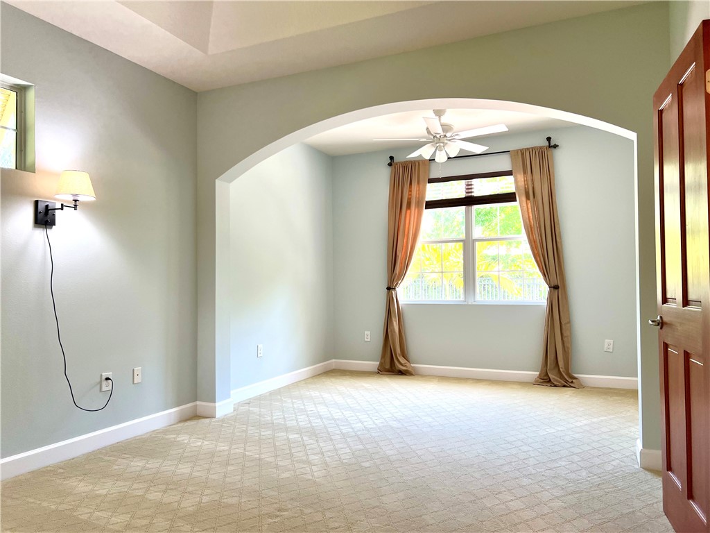 4231 Diamond Square Vero Beach, FL 32967 - Photo 17 of 28 a view of an empty room with a window