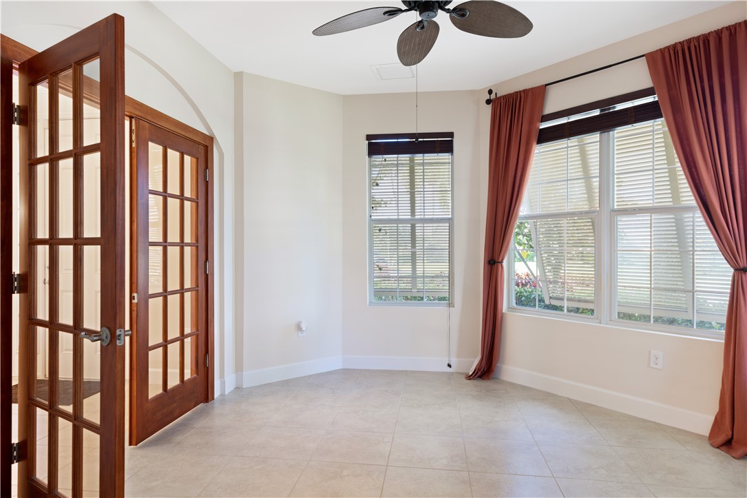 4231 Diamond Square Vero Beach, FL 32967 - Photo 21 of 28 a view of an empty room with a window
