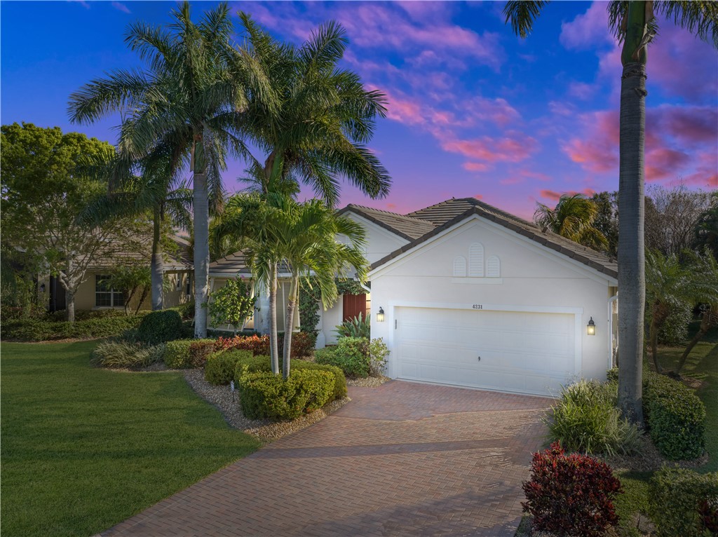 4231 Diamond Square Vero Beach, FL 32967 - Photo 4 of 28 a view of a house with a yard