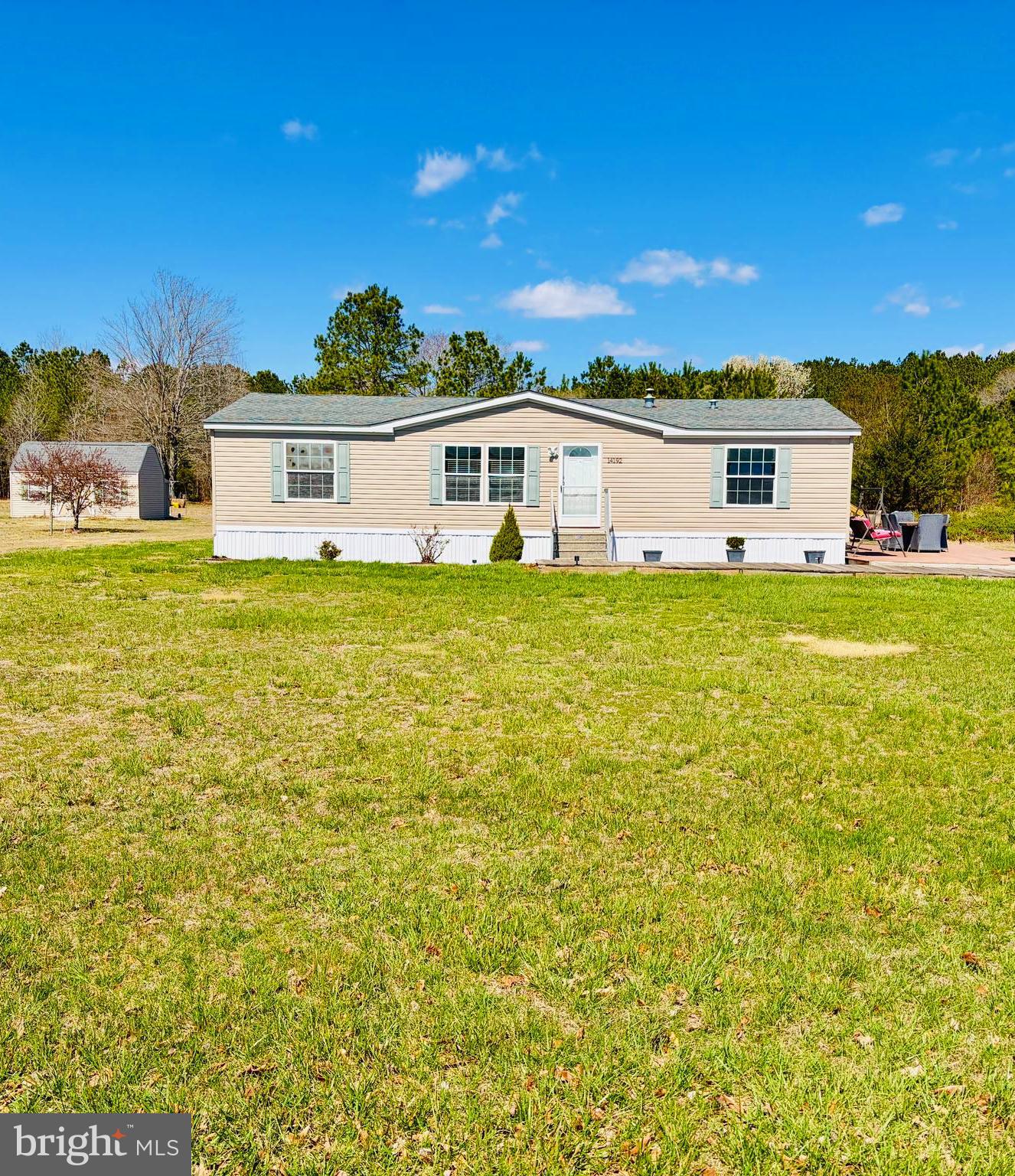14192 Backbone Road Eden, MD 21822 - Photo 53 of 53 a front view of a house with a garden