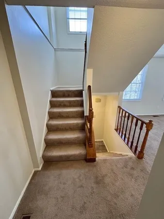 a view of an entryway with stairs