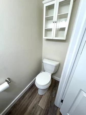 a bathroom with a toilet and a sink