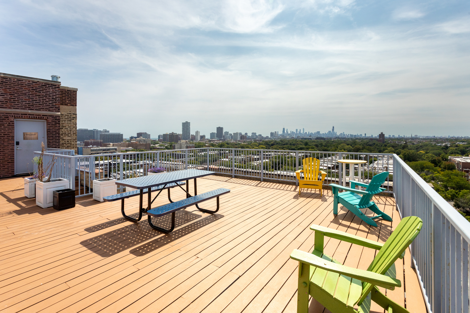 1325 West Wilson Avenue, Unit 605 Chicago, IL 60640 - Photo 2 of 20 a view of a terrace with chairs