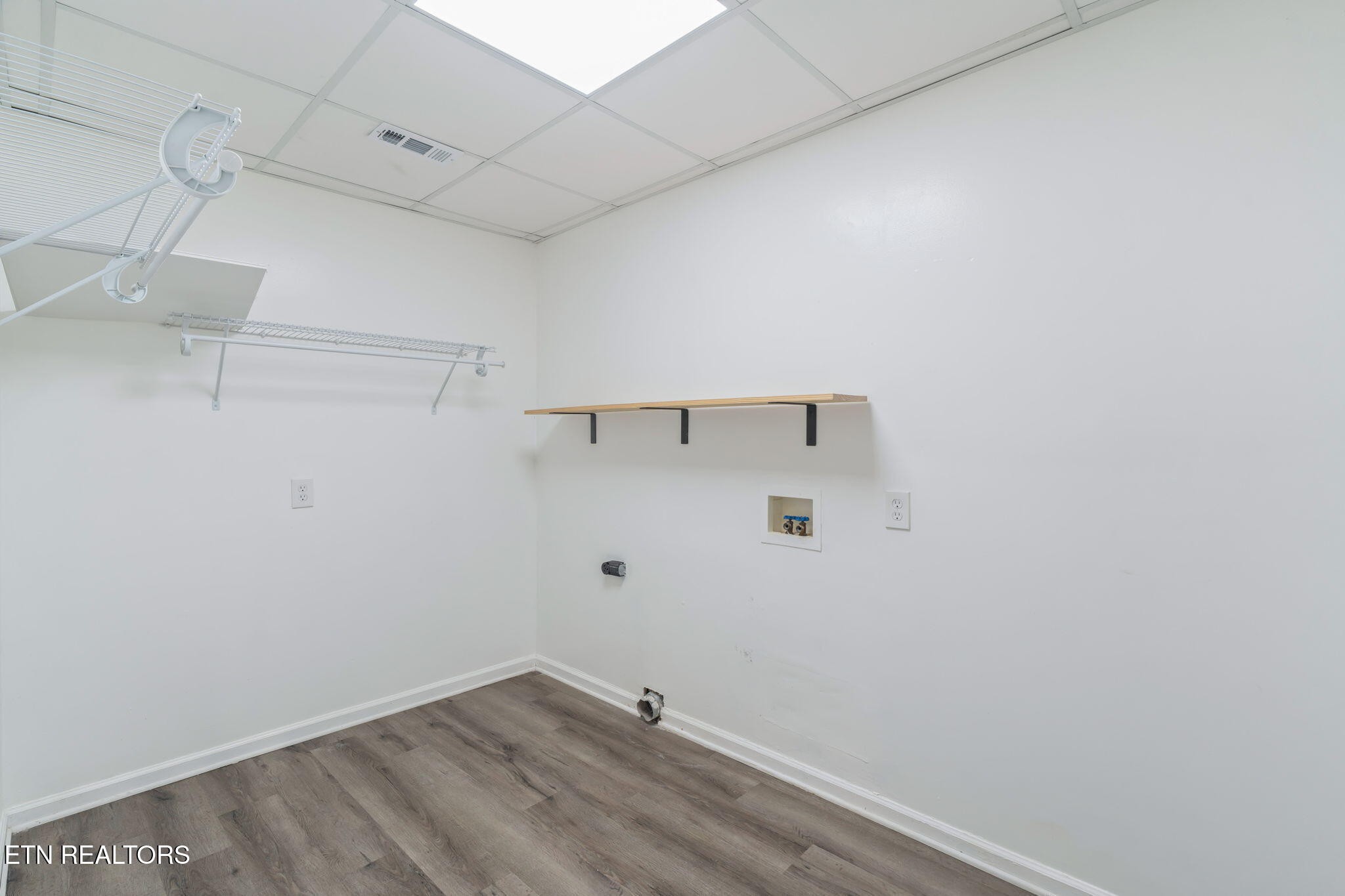 8533 Constance Way Knoxville, TN 37923 - Photo 21 of 30 a view of a room with racks on the wall