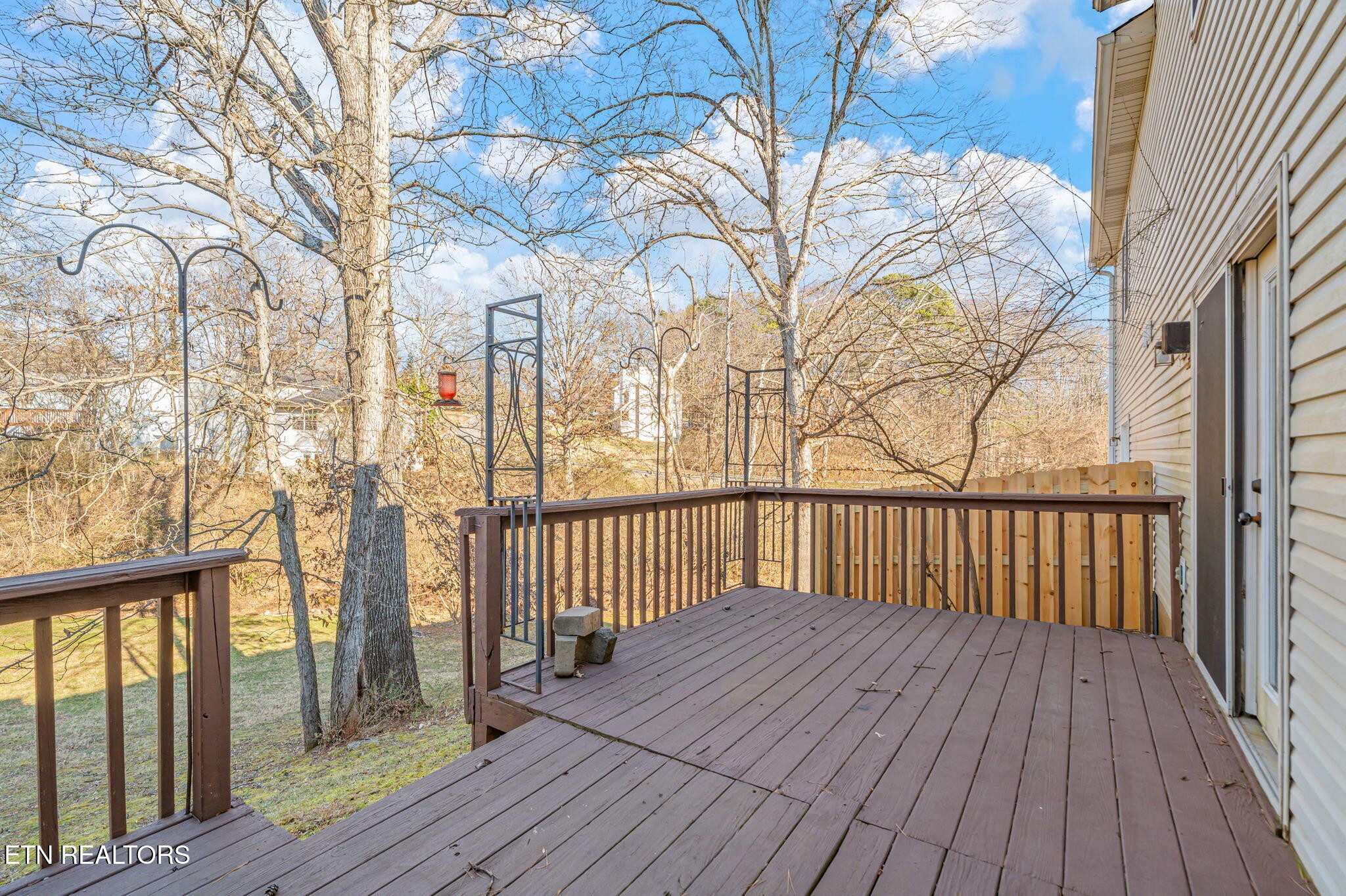8533 Constance Way Knoxville, TN 37923 - Photo 27 of 30 a view of a wooden balcony with wooden floor