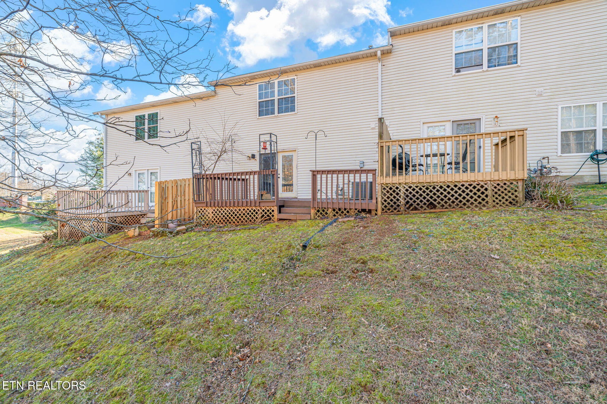 8533 Constance Way Knoxville, TN 37923 - Photo 30 of 30 a view of a house with a yard and a garage
