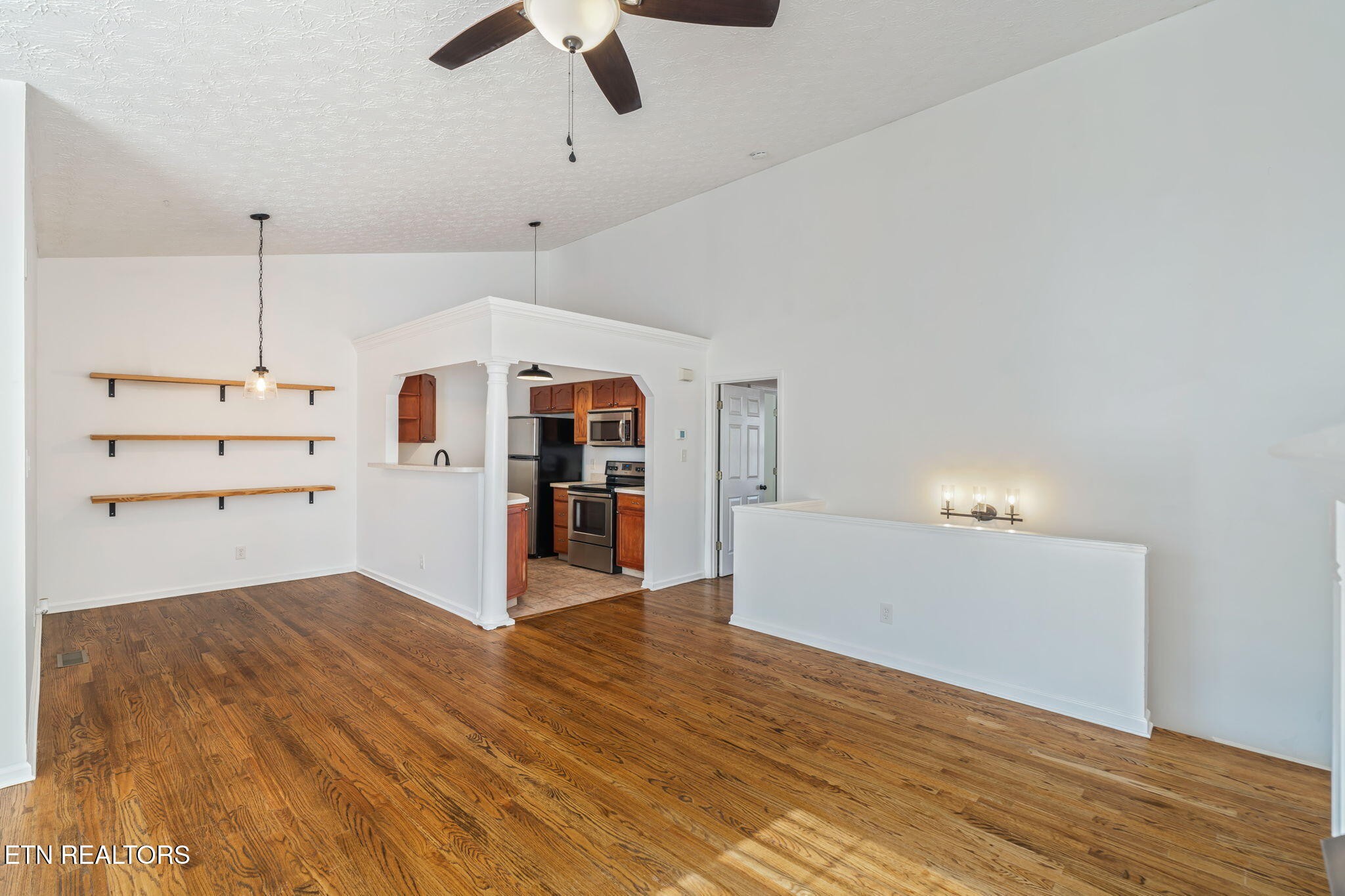 8533 Constance Way Knoxville, TN 37923 - Photo 6 of 30 a view of empty room with wooden floor