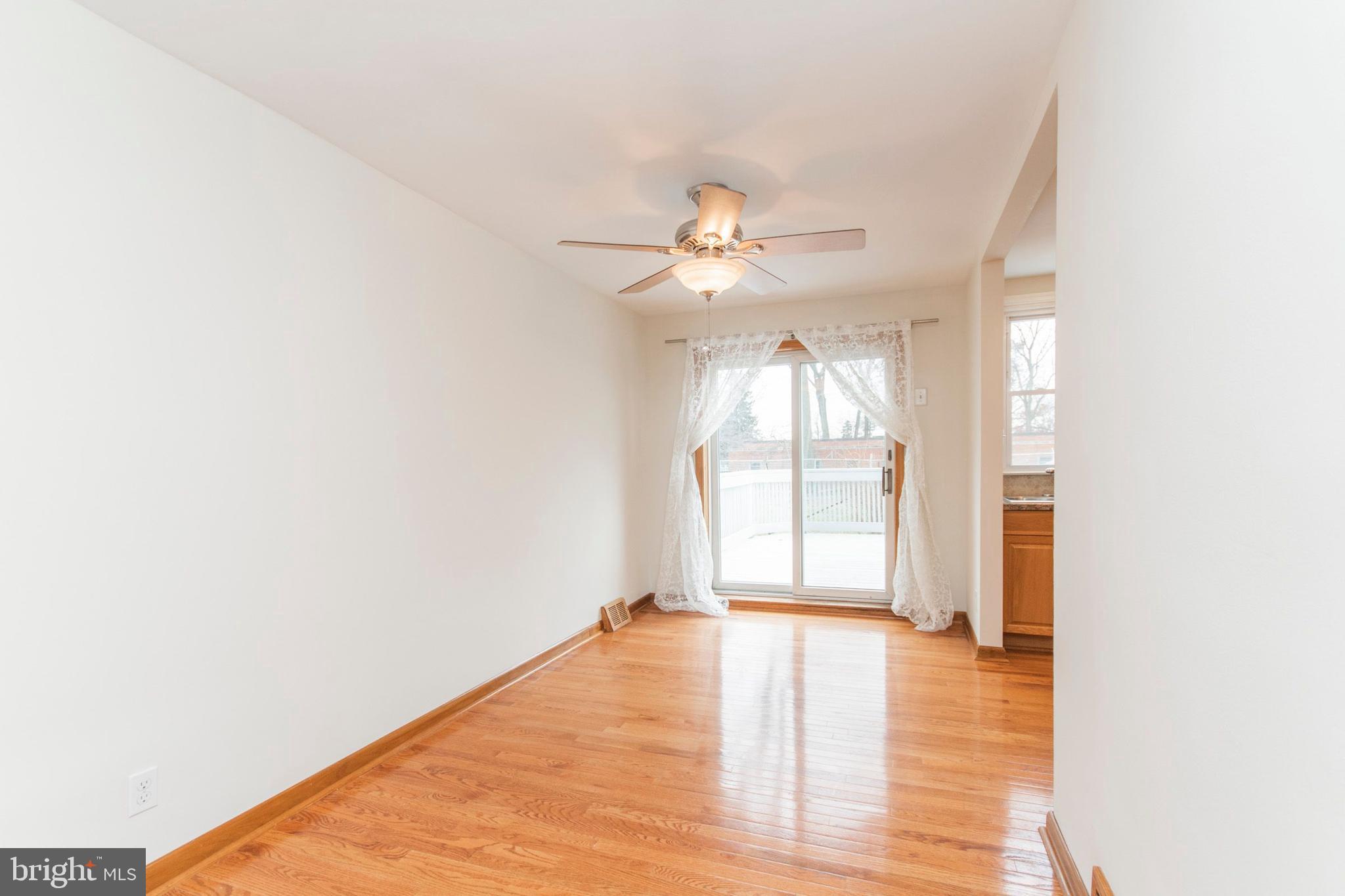 8612 Rugby Street Philadelphia, PA 19150 - Photo 13 of 25 Dining Room With Sliders to Deck