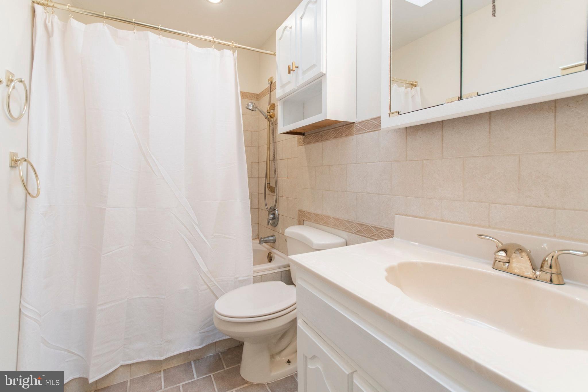 8612 Rugby Street Philadelphia, PA 19150 - Photo 18 of 25 Full Hall Bath With Skylight