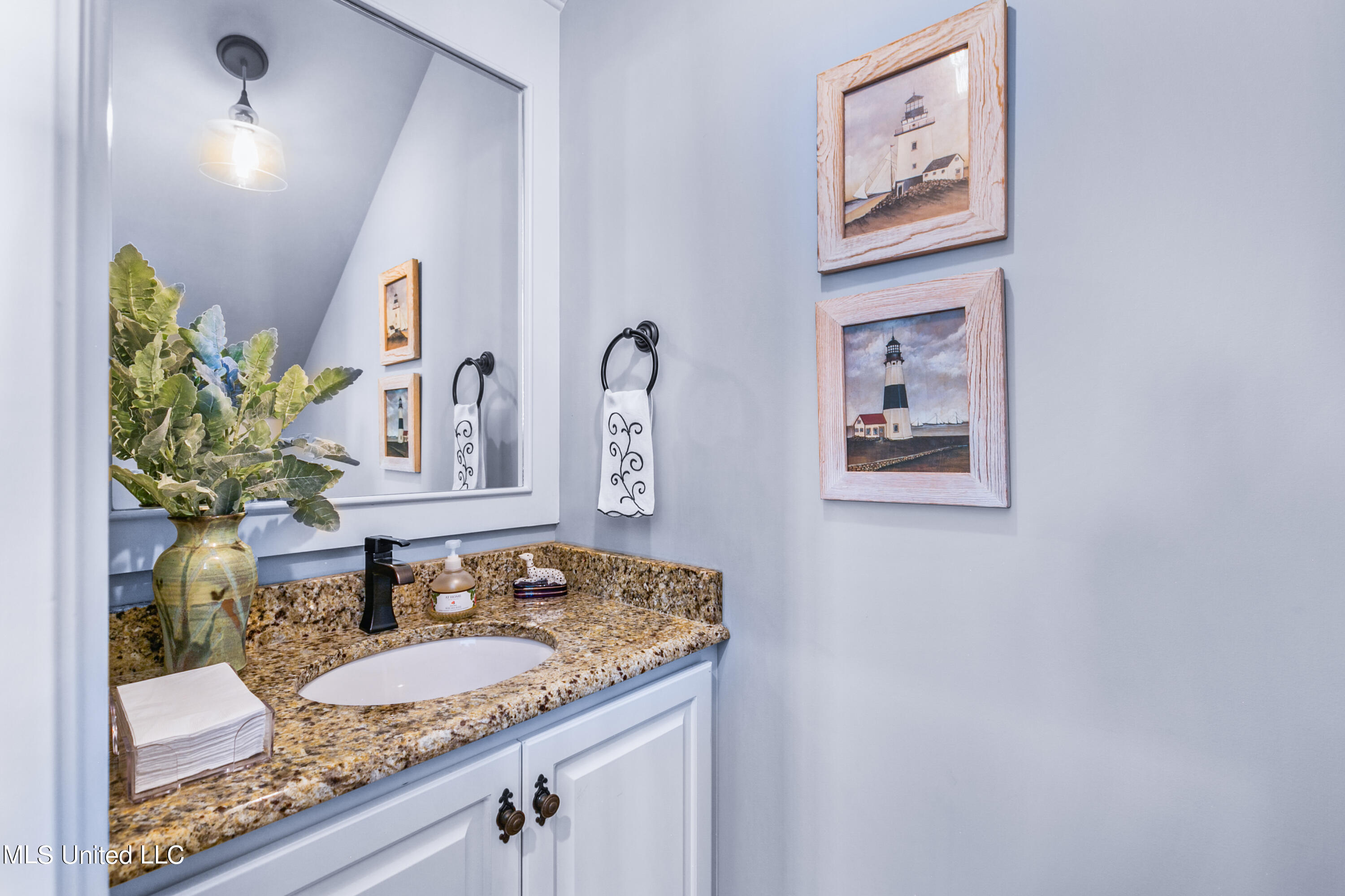 208 Eastpark Street Ridgeland, MS 39157 - Photo 33 of 60 Half bath under the stairs