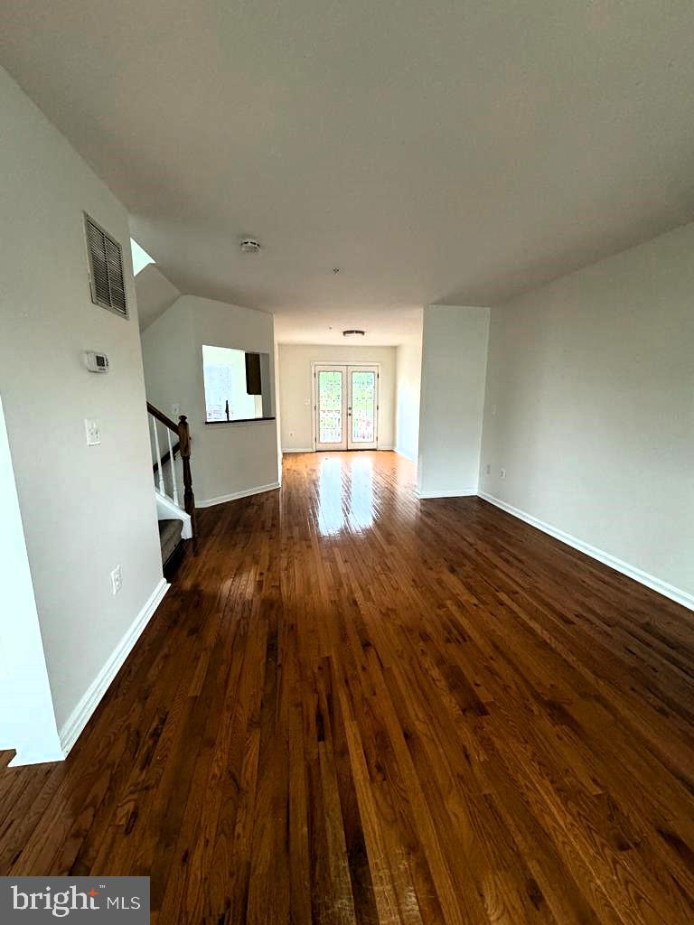 7520 Maury Road Baltimore, MD 21244 - Photo 19 of 29 a view of empty room with wooden floor and fan