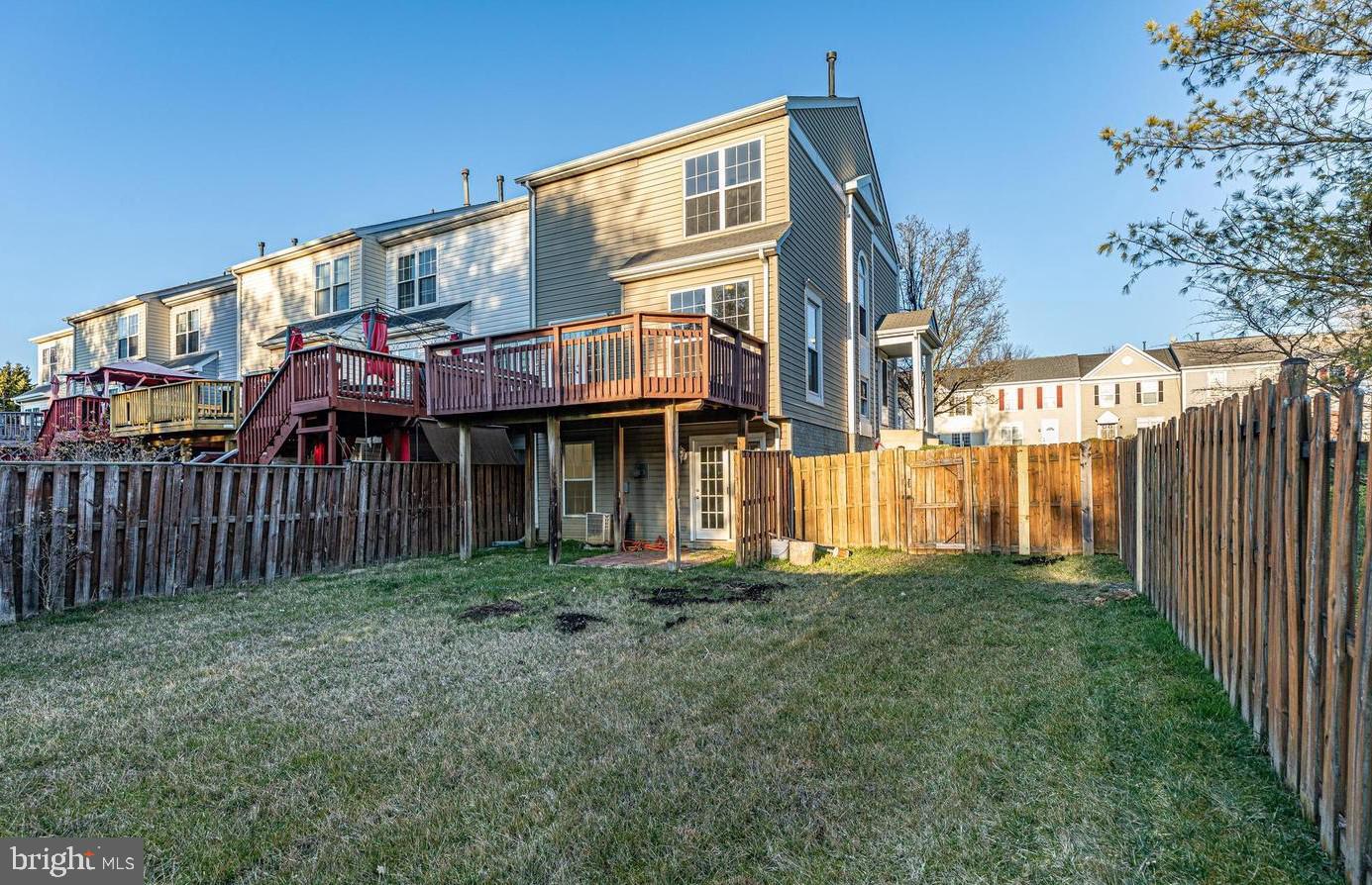 7520 Maury Road Baltimore, MD 21244 - Photo 28 of 29 a view of a house with a yard