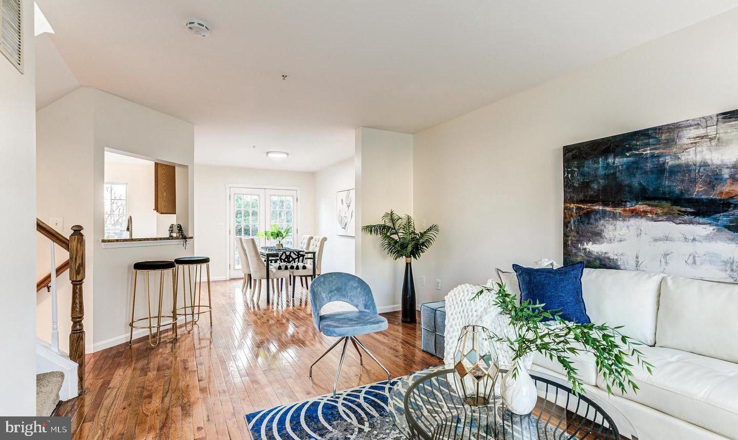 7520 Maury Road Baltimore, MD 21244 - Photo 4 of 29 a living room with furniture and wooden floor