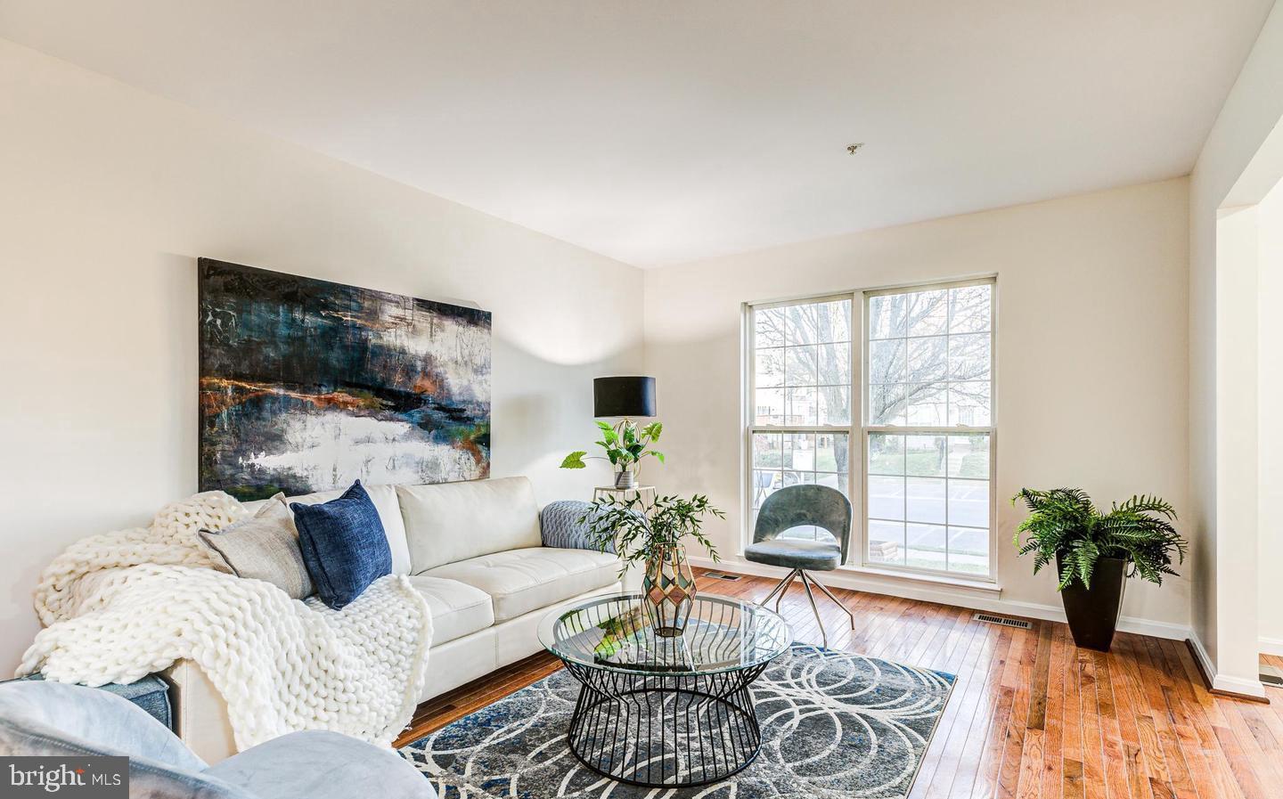 7520 Maury Road Baltimore, MD 21244 - Photo 5 of 29 a living room with furniture and a large window