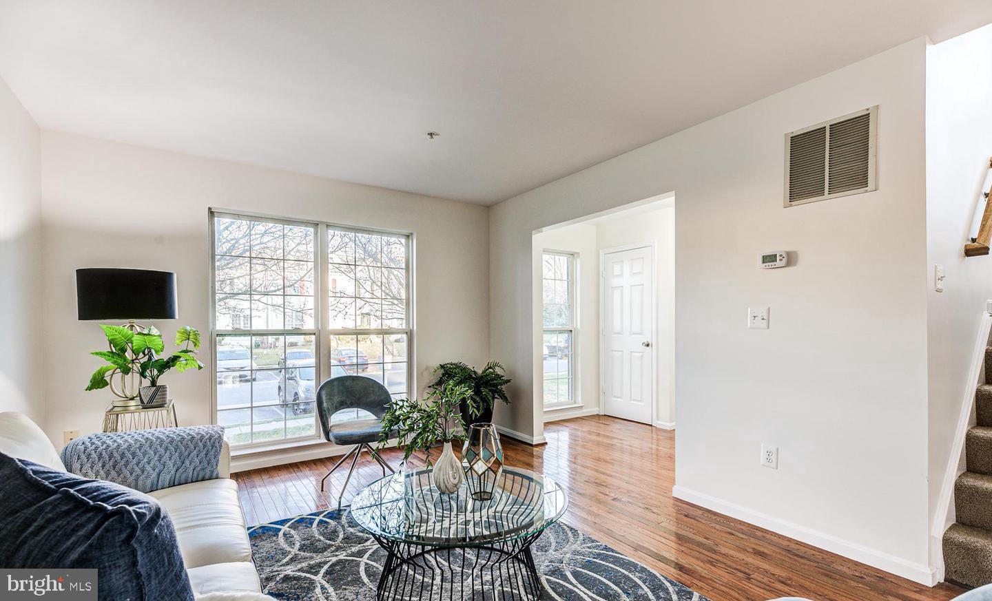 7520 Maury Road Baltimore, MD 21244 - Photo 6 of 29 a living room with furniture potted plant and a window