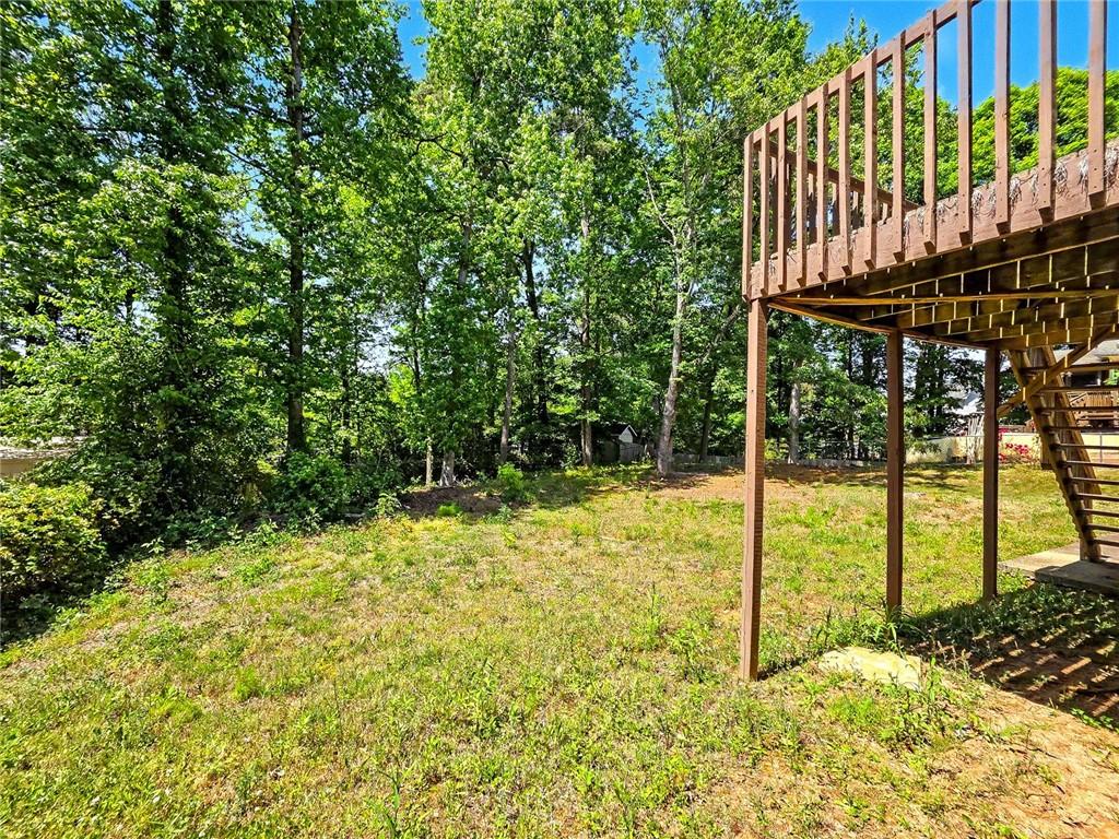 2205 Springer Walk Lawrenceville, GA 30043 - Photo 24 of 26 a view of an outdoor space and deck