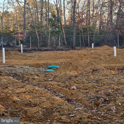 a house with trees in the background