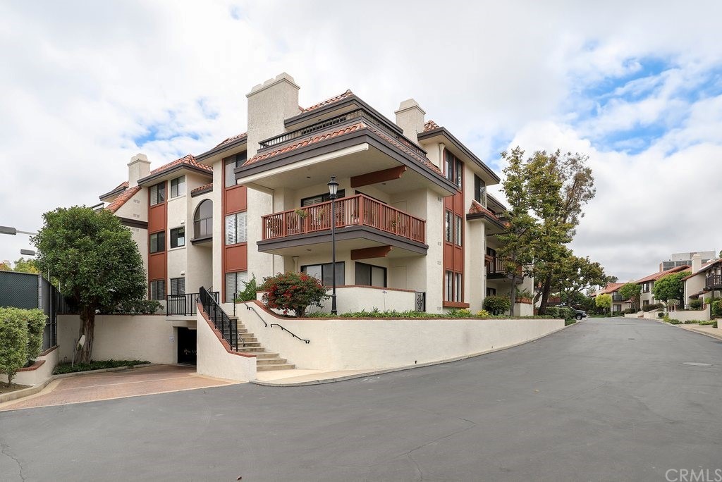 a view of a building with a street