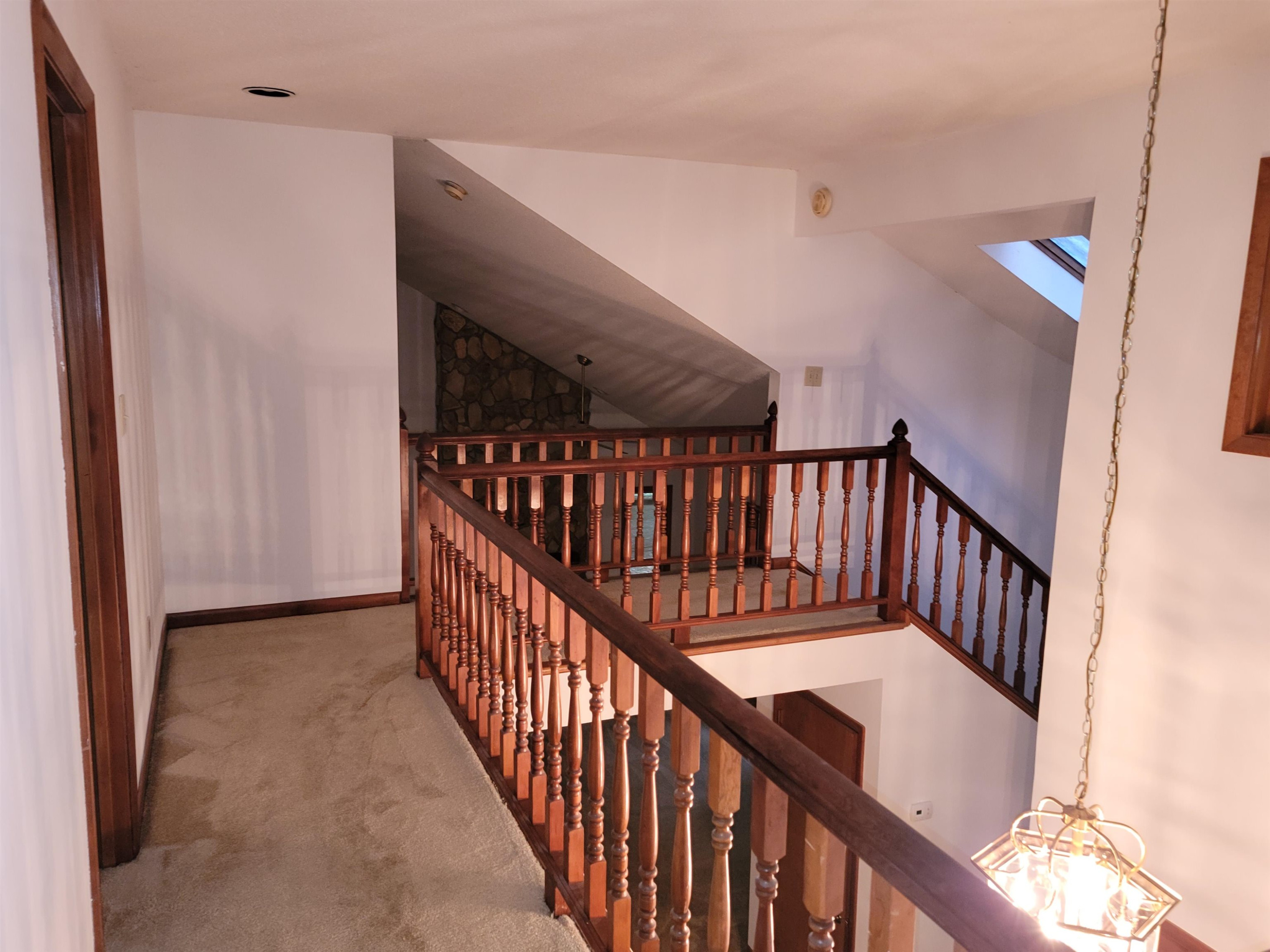 7816 Netherlands Drive Raleigh, NC 27606 - Photo 14 of 60 a view of entryway with wooden floor