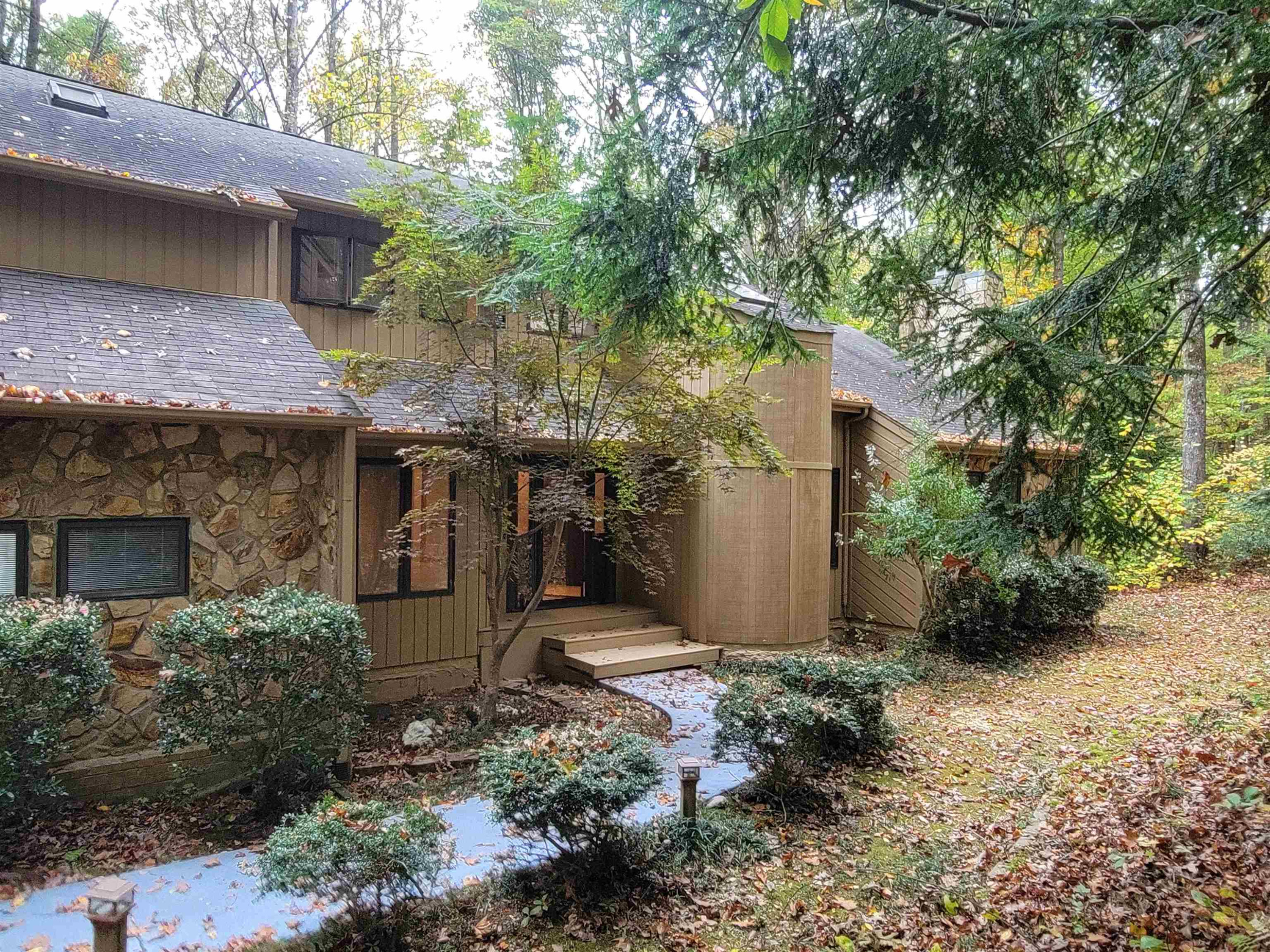 7816 Netherlands Drive Raleigh, NC 27606 - Photo 2 of 60 a front view of a house with a yard
