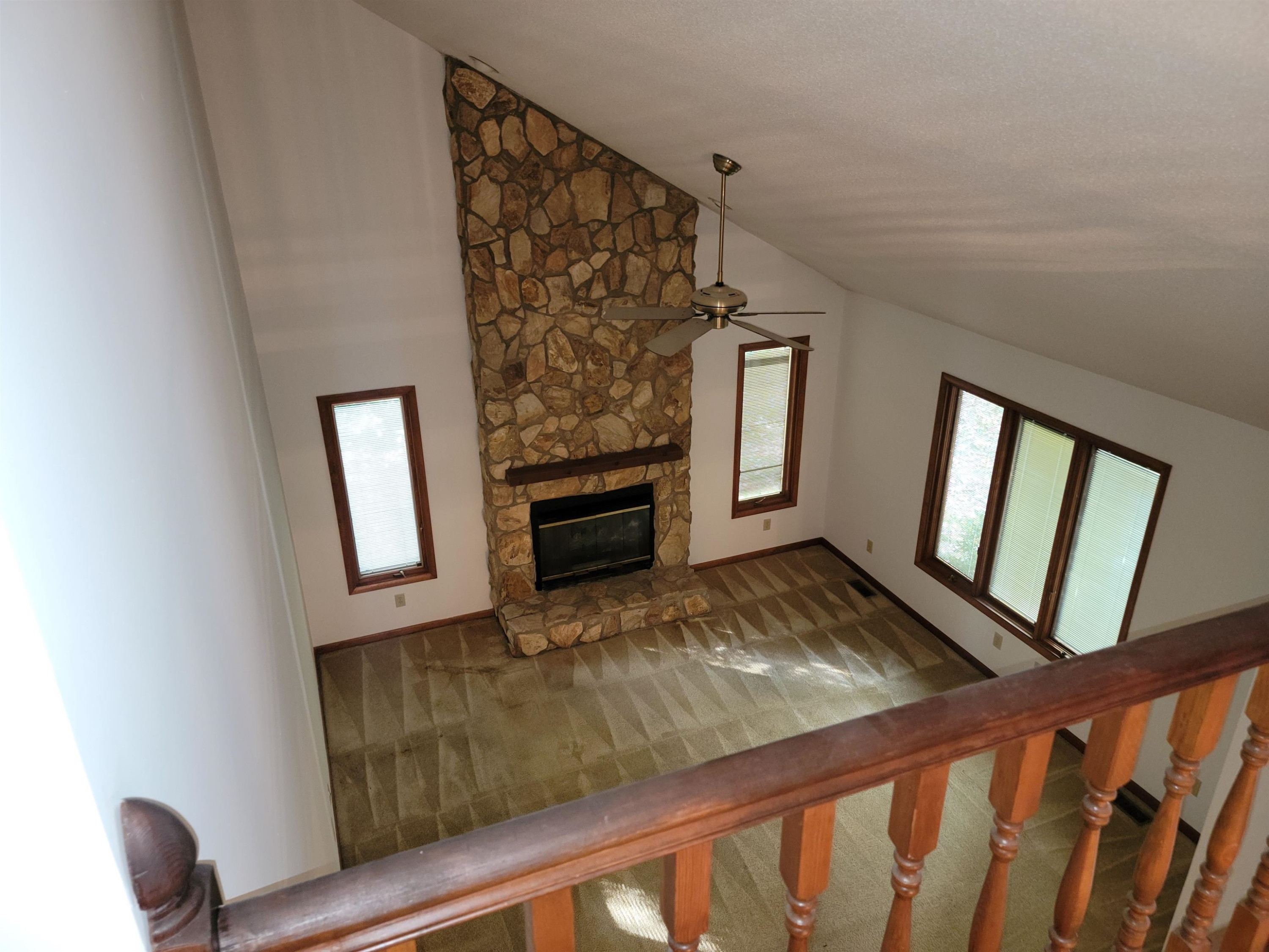 7816 Netherlands Drive Raleigh, NC 27606 - Photo 22 of 60 a view of livingroom with hardwood floor and fireplace