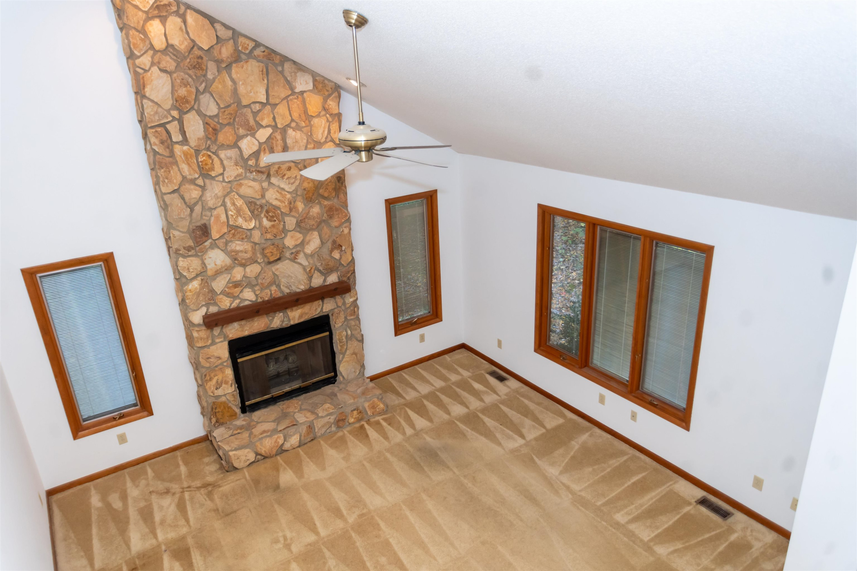 7816 Netherlands Drive Raleigh, NC 27606 - Photo 35 of 60 a view of an empty room and fire place