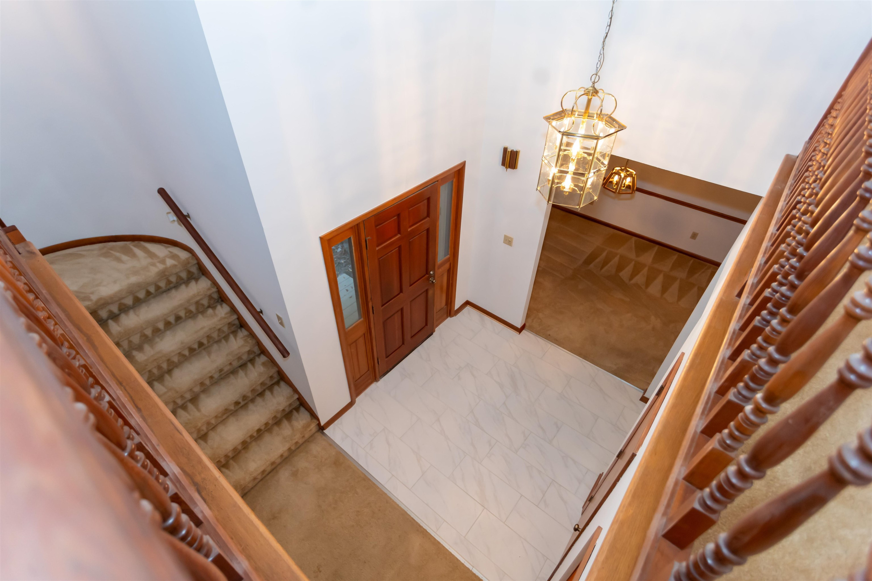 7816 Netherlands Drive Raleigh, NC 27606 - Photo 45 of 60 a view of an entryway with staircase