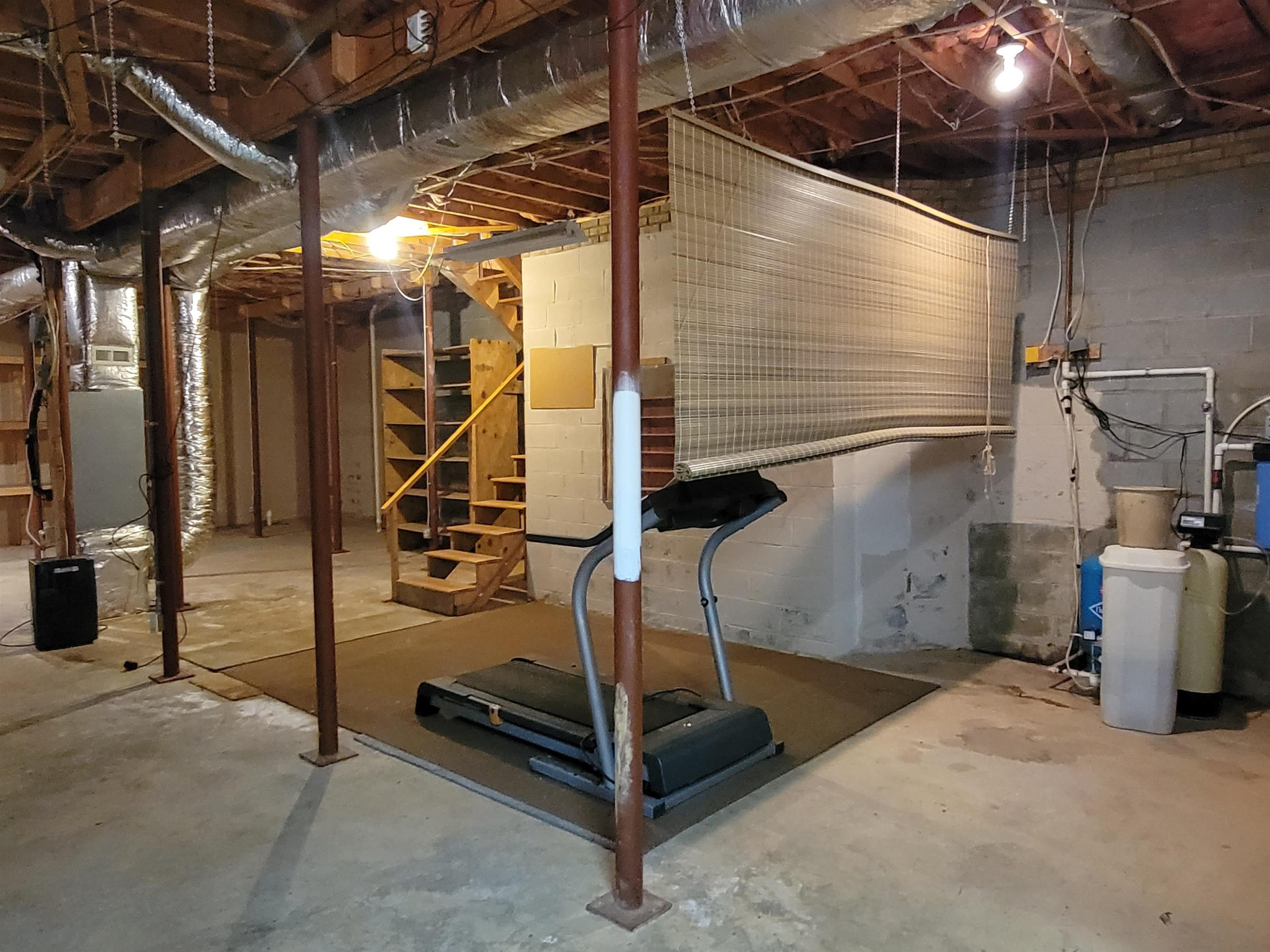 7816 Netherlands Drive Raleigh, NC 27606 - Photo 48 of 60 a view of a room with wooden floor