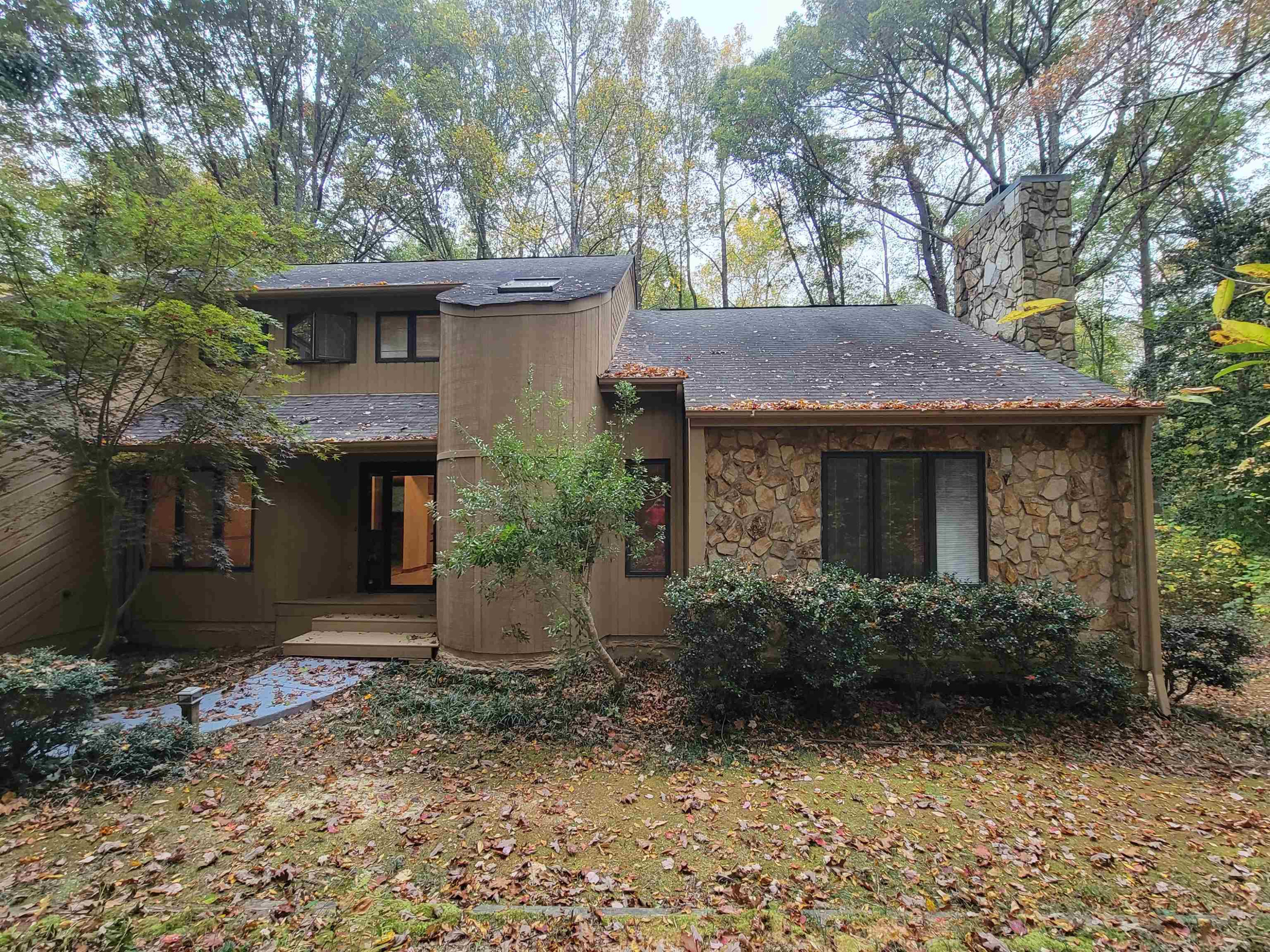 7816 Netherlands Drive Raleigh, NC 27606 - Photo 5 of 60 a front view of a house with garden